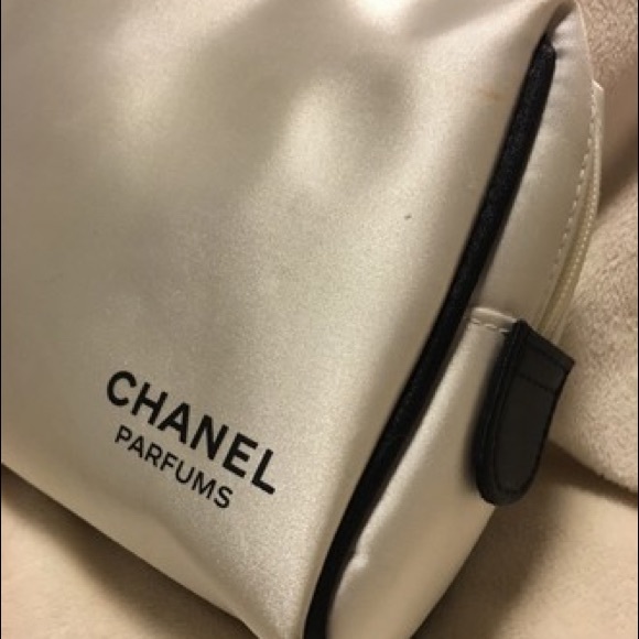 CHANEL Handbags - Chanel parfums nylon satin zippered bag ivory w/black RARE Vintage